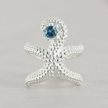Meeresrauschen großer Seestern Ring  mit London Blue Topas
