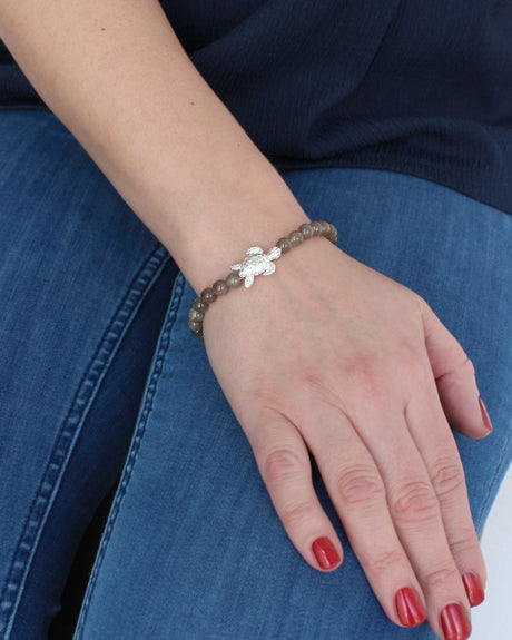 Meeresrauschen dunkelgraues Mondstein Armband mit Turtle in der Länge 19,5 cm