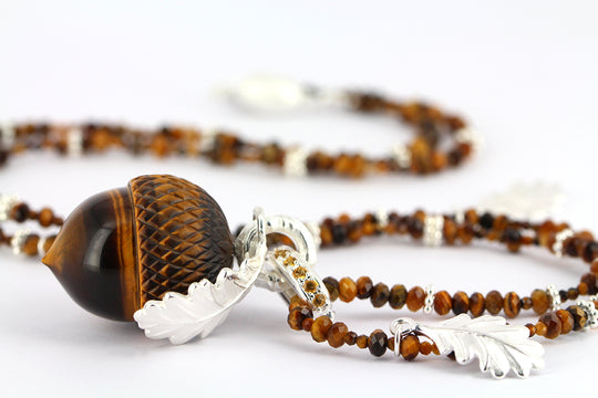 Waldperlchen Weda Eichel aus Tigerauge inklusive Klappöse mit Citrinpavée und Kette in der Länge 80 cm-EINZELSTÜCK