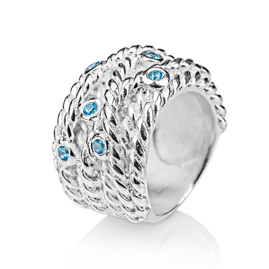 Heimathafen großer Bandring in Taustruktur mit Topasen